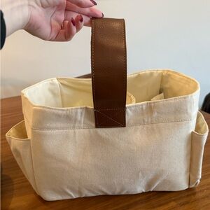 Crate and Barrel diaper caddy with leather strap